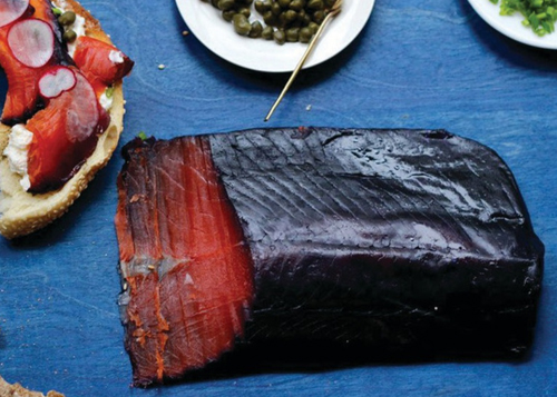 Slices of Blueberry Salmon Gravlax on Cutting Board