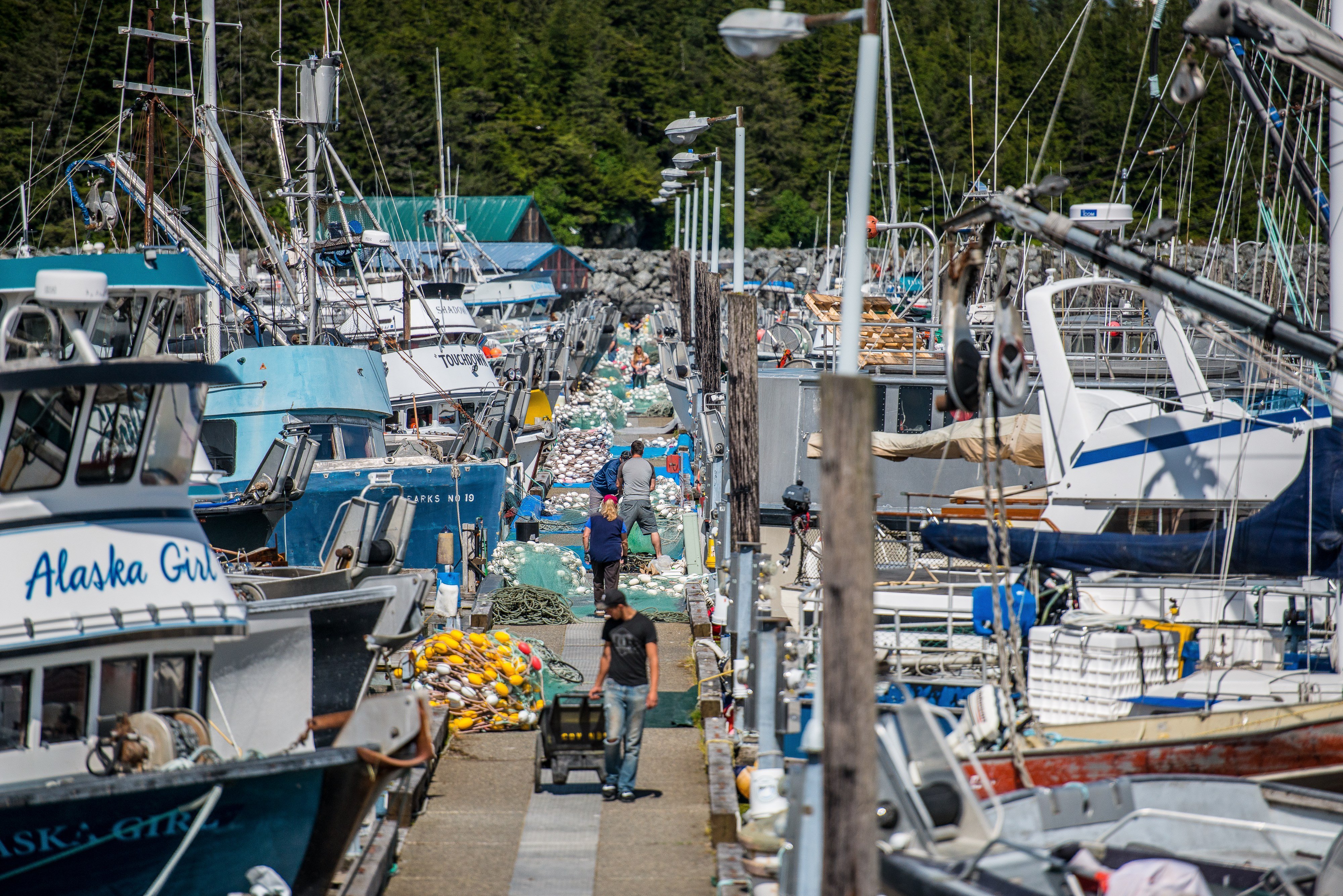 Cordova's harbor is bustling with fishermen and net menders in preparation of the start of another commercial salmon season.