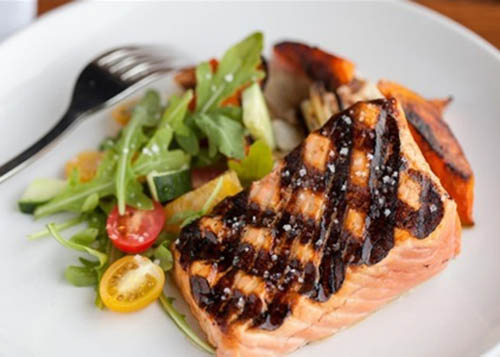 Grilled Salmon on Plate with Vegetables